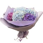 Букет из голубых и фиолетовых гортензий в упаковке в Санкт-Петербурге - Фотография 2