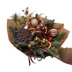 Новогодний букет Лулео с еловыми ветками, шишками, цветком лотоса, новогодними игрушками и сушеными апельсинами в Санкт-Петербурге - Фотография 4